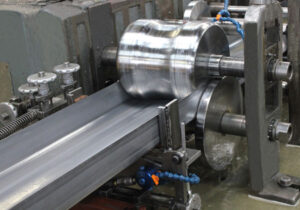 Industrial Construction Rollers for the fabrication of steel or aluminum siding, gutter aprons, and roof edges produced by the roller company of Minnesota Roller Service in Montgomery, Minnesota.